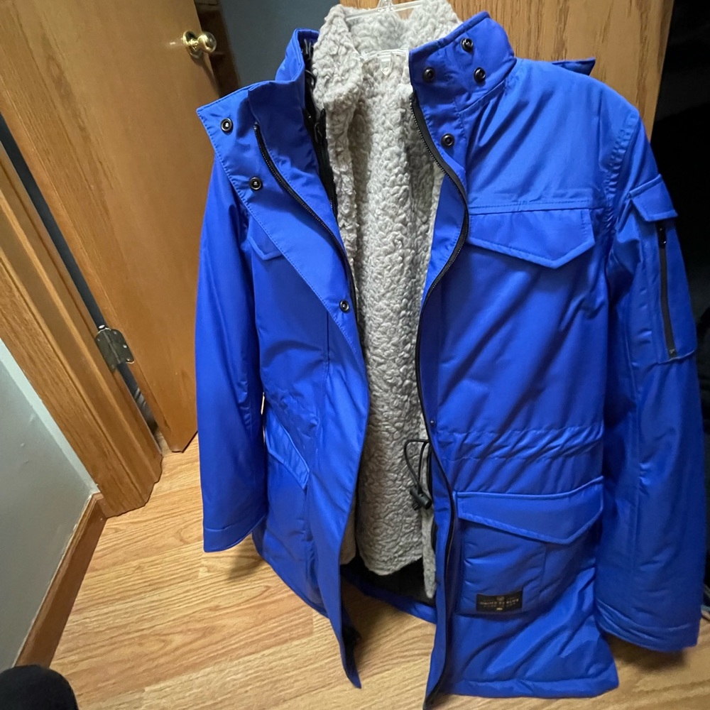 United by blue winter coat. Never worn but the tags are no longer on it.